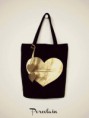 /album/bolsos/bolso-de-corazon-negro-dorado-jpg/